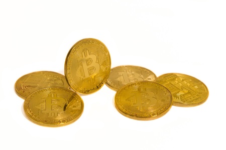 Gold coins bitcoin isolated on white backgroundの写真素材