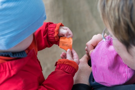 Little boy drew a blank by lot - English words: New ticket - new luck!の写真素材
