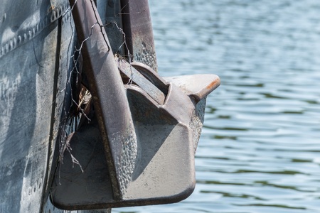 Bow of a ship with a retracted anchorの写真素材
