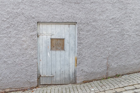 Old historical wooden door with heavy iron fittings, Germany