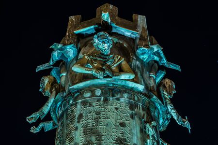 Hechingen, Baden-Württemberg, Germany, September 14, 2019, Night shot of the illuminated fountain on the market place in front of the town hall in Hechingen in Baden-Württemberg, Germany by the sculptor Klaus Ringwaldのeditorial素材