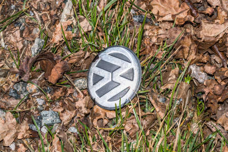 Grafenau, Bayern, Germany, March 15, 2020, VW logo on the ground at the roadsideのeditorial素材