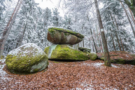 Wackelstein near Thurmansbang megalith granite rock formation in winter in bavarian forest, Germanyの写真素材