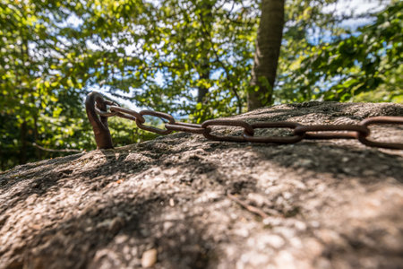 Close-up of iron chain at Wackelstein Regenstauf in the cult place from the prehistory of ancestors and ancestors in Upper Palatinate Bavaria and Germanyの写真素材