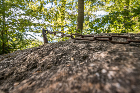 Close-up of iron chain at Wackelstein Regenstauf in the cult place from the prehistory of ancestors and ancestors in Upper Palatinate Bavaria and Germanyの写真素材