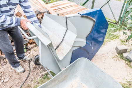 Close up of circular saw with logs for wood cutting, Germanyの写真素材