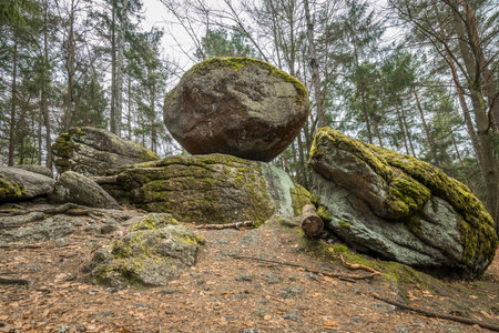 Wackelstein near Thurmansbang megalith granite rock formation in winter in Bavarian forest, Germanyの写真素材
