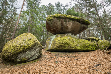 Wackelstein near Thurmansbang megalith granite rock formation in winter in Bavarian forest, Germanyの写真素材