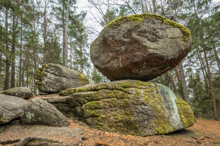 Wackelstein near Thurmansbang megalith granite rock formation in winter in Bavarian forest, Germanyの写真素材