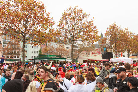 Start of Carneval in Cologne at 11.11.2014 on Heumarkt with crowd in costumesのeditorial素材