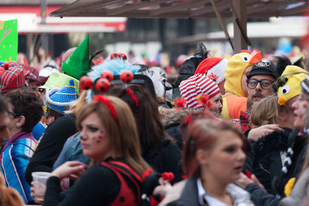 Start of Carneval in Cologne at 11.11.2014 on Heumarkt with crowd in costumesのeditorial素材