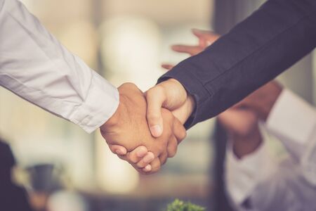 Teamwork Shake Hands Partnership Concept.team corporate discussion at workplaceの写真素材