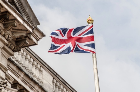 Union Jack blowing in the wind London England の素材