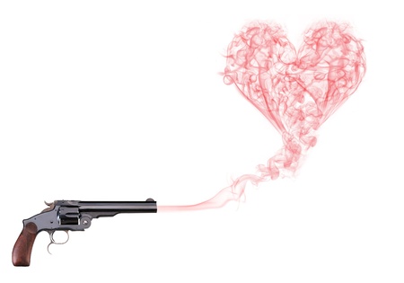 Gun with smoke hearth isolated on white backgroundの写真素材