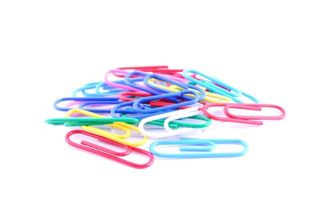 Pile of  color paper clip isolated on a white backgroundの写真素材