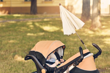 Pram in the park with umbrella, detailの写真素材