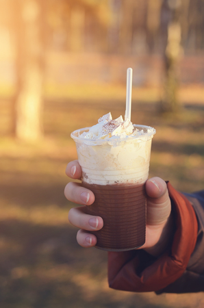 Woman hand holding a coffeeの写真素材
