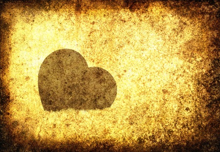 Vintage photo of heart shape on textured backgroundの写真素材