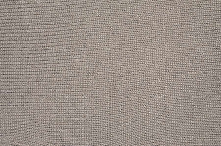 Gray knitted fabric background, detail