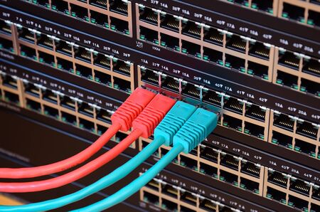 Closeup photo of router with connected network cables