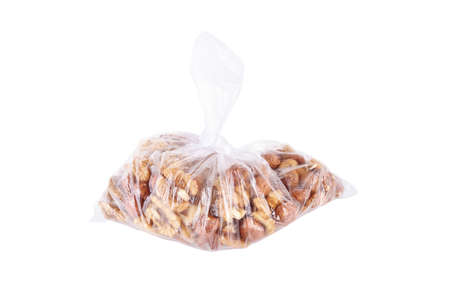 Pack of walnut and hazelnut isolated on white backgroundの写真素材