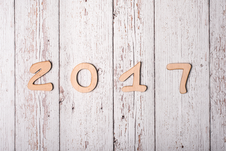White wooden background with the word 2017