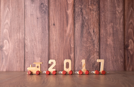 New year 2017 train on a wooden backgroundの写真素材