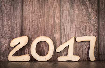 Wooden background with the word 2017 textの写真素材