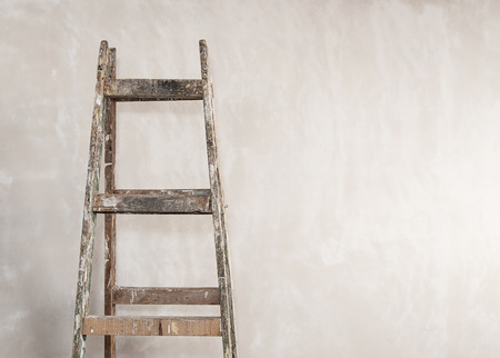 Used wooden ladder in constructionの写真素材