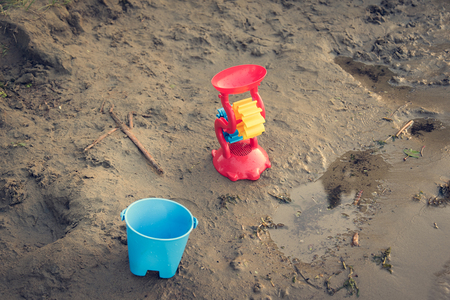 Plastic toys on the beachの写真素材