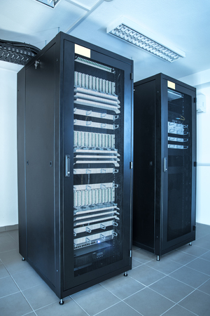 Closeup photo of a rack cabinet in the server room