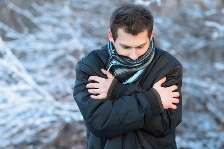 Man in the nature a frosty winter's dayの写真素材