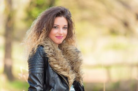 Beautiful woman relaxing in the park