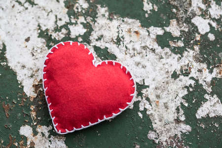 Hand made heart shape, love symbol on gravel backgroundの写真素材
