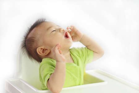 Asian baby callingの写真素材