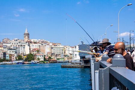 People fishing on the Galata bridge, Istanbul, Turkeyのeditorial素材