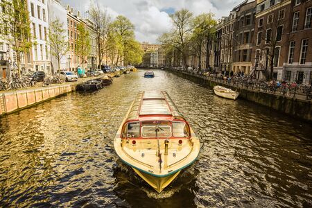 Houses and Boats on Amsterdam Canalの写真素材
