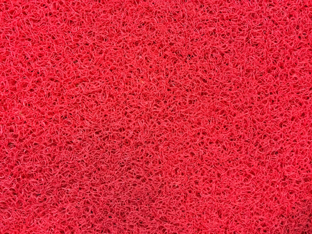 Texture of red fiber carpet.の写真素材