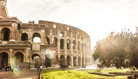 Rome, Italy - December 12, 2016: Famous landmark Colosseum in vintage style and sunlight effect.のeditorial素材