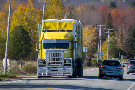 Truck transport on the highway, Magog, QuÃ©bec, Canada, October 27 2021のeditorial素材