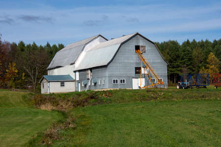 Barn on a farm in the canadian countryside in Quebec