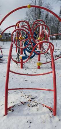 Section of a children's play module in a public park at the start of winterの写真素材