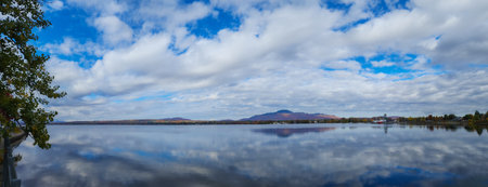 Magnificent autumn landscapes near a lake in the Canadian forest in the province of Quebecの写真素材