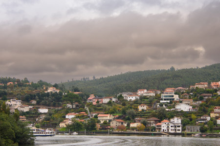 The Douro, river of Portugal, with its cruise ships and its stepped hillsの写真素材