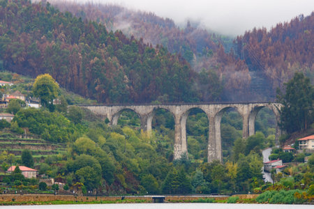 Bridge that overlooks the beautiful Douro River in the heart of Portugalの写真素材
