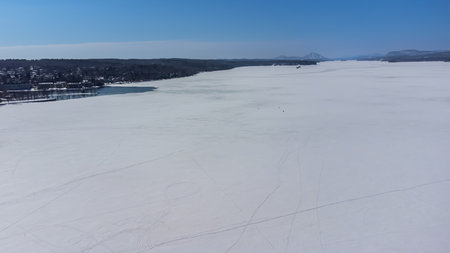 View of a small lake in the Canadian forest in winterの写真素材