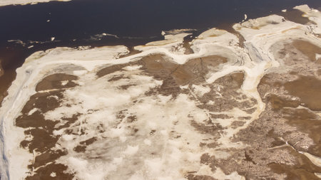 Melting ice in the spring on a lake in the Canadian forest in Quebec