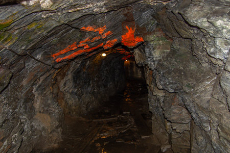 Entrance to a pretty cave in the heart of the Canadian forest