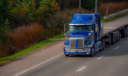 Heavy truck on a Canadian highway in the fall in Quebecの写真素材