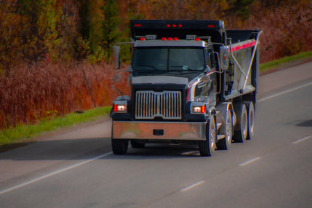 Heavy truck on a Canadian highway in the fall in Quebecの写真素材